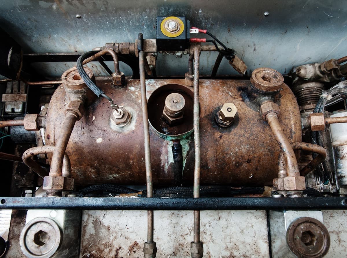 Limescale and corrosion damage on commercial boiler equipment